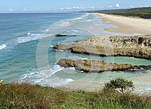 Ocean views over Main Beach, a surf beach on a tropical island paradise off Queensland, Australia