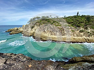 Ocean views from a rocky headland on a tropical island paradise off Queensland, Australia