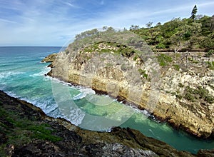 Ocean views from a rocky headland on a tropical island paradise off Queensland, Australia