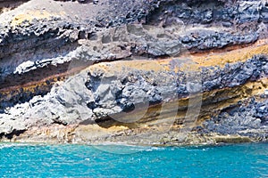 Ocean volcanic cliff