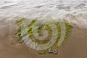 Ocean water over the rock.