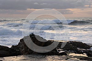 Ocean wave against rocks