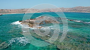 Ocean wave background breaking sea water rocky shore rough seas turquoise water gradient foam,