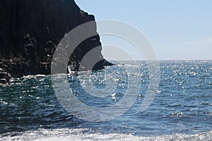 Ocean wave on the black sandy beach of Playa de Zamora Chica, La Plama