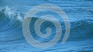 An Ocean Wave Breaking on the Beach in California