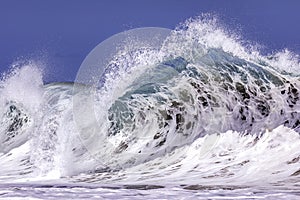 Ocean Wave Closeup Water. Ocean wave closeup detail of upright crashing hollow breaking water.