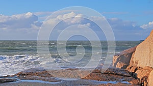 Ocean wave crashing on a coast in Nazare