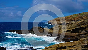 Ocean wave in Hawaii rock coast