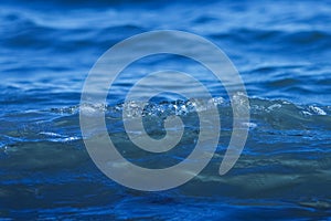 Ocean wave splashing on the beach.