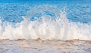 Ocean wave with spray, sea summer. crash sky
