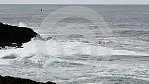 Ocean Waves Against Black Lava Rock Shore Depoe Bay Oregon