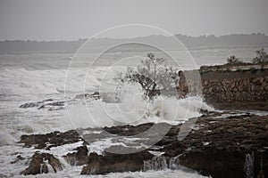 Ocean waves against a rocky coast
