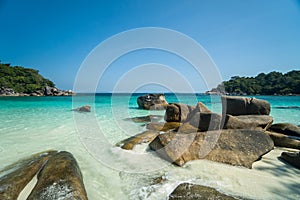 Ocean waves, Beautiful tropical beach and rocky coastline and beautiful forest. Nga Khin Nyo Gyee Island Myanmar. Tropical seas photo