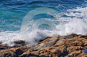 Ocean waves crashing on rocks
