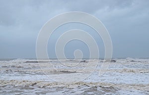 Ocean with Waves and High Tide with Cloudy Sky in Monsoon and Vayu Cyclone Storm - Seascape Background Wallpaper