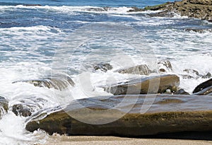 Ocean waves on rocky shoreline