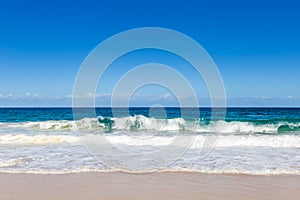 Ocean Waves at Sand Beach of Shoal Bay, New South Wales, Australia