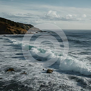 Ocean waves, sea water motion, coastal scenery photo