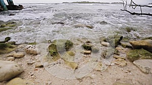 Ocean Waves On Stone Beach