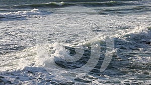 Ocean waves surf rolling into shore slow HD