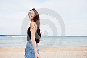 ocean woman sand young summer beach tropical vacation smile nature sea