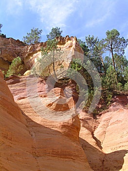 Ochre Cliff Roussillon, Nature Park, Vaucluse, Provence, France, le sentier des ocres, Orange and Green Colors photo