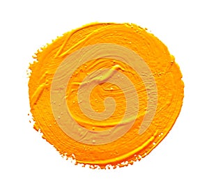 Ochre round strokes of the paint brush isolated photo