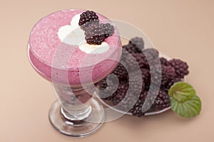 Ð¡ocktail of banana with frozen blackberries