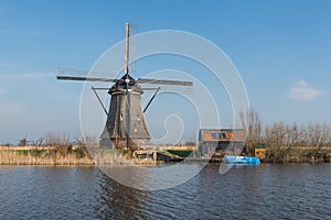 Octagonal thatched windmill in Kinderdijk Netherlands