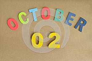 October 02, Toy alphabet background.