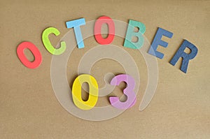 October 03, Toy alphabet background.