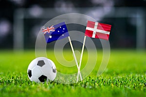October 2022: Australia vs. Denmark, Al Janoub Stadium, Football match wallpaper, Handmade national flags and soccer ball on green