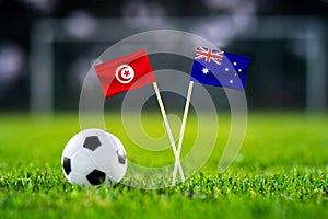 October 2022: Tunisia vs Australia, Al Janoub Stadium, Football match wallpaper, Handmade national flags and soccer ball on green