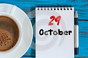 October 29th. Day 29 of month, hot drink cup with calendar on human-resources manager workplace background. Autumn time