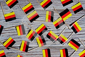 October 3, happy Day of German unity. the concept of patriotism , freedom and independence. Mini flags on wooden background