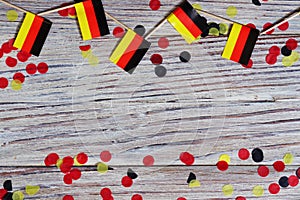 October 3, happy German independence Day. the concept of patriotism , freedom and independence. Mini paper flags with yellow and
