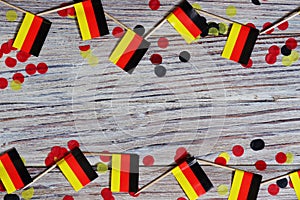 October 3, happy German independence Day. the concept of patriotism , freedom and independence. Mini paper flags with yellow and