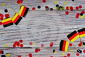 October 3, happy German independence Day. the concept of patriotism , freedom and independence. Mini paper flags with yellow and