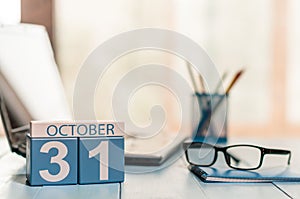 October 31st. Day 31 of month, calendar on human-resources manager workplace background. Autumn time. Empty space for