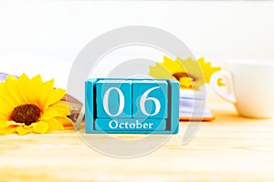 October 6 on the wooden calendar.The sixth day of the autumn month, a calendar for the workplace.