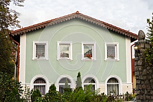 October 7, 2023 Russia, Zelenogradsk, German buildings, beautiful two-story houses in the city center among green plants