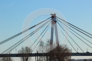 October Bridge on the background of the blue bridge