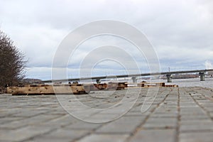 October bridge in the city of Cherepovets, Vologda Oblast, against the backdrop of a cloudy autumn sky