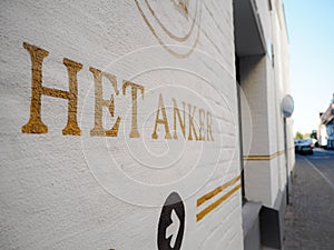 October 2018 - Mechelen, Belgium: Narrow alley leading to the old original entrance of the brewery Het Anker in the beguinage in