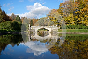 October on the river Slavyanka. Landscape with old by Viskontiev bridge in Pavlovsk Palace Park. Saint Petersburg