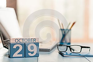October 29th. Day 29 of month, calendar on editor workspace background. Autumn time. Empty space for text