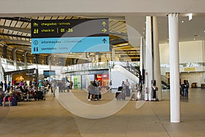 4 October 2017 Travelers in the refurbished and modernised check in area and shopping concourse of Faro Airport in Portugal