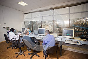 October 10, 2014. Ukraine.Kiev. Subject industry and people at work. Caucasians in the factory control room are closely monitoring