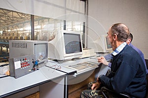 October 10, 2014. Ukraine.Kiev. Subject industry and people at work. Caucasians in the factory control room are closely monitoring