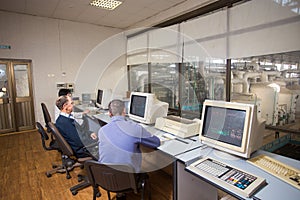 October 10, 2014. Ukraine.Kiev. Subject industry and people at work. Caucasians in the factory control room are closely monitoring